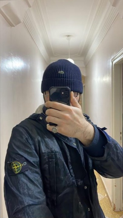 Mirror outfit with dark jacket and navy beanie